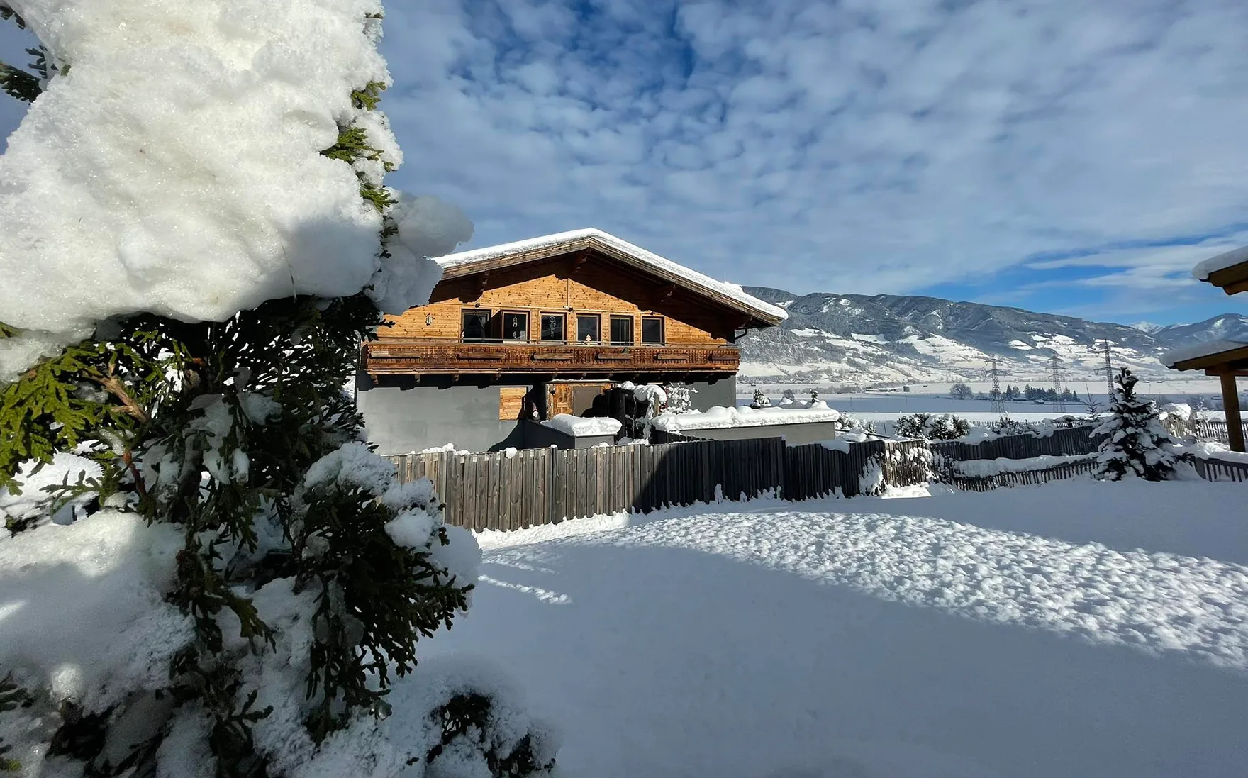 DogMountainInn in the snowy mountain landscape in winter